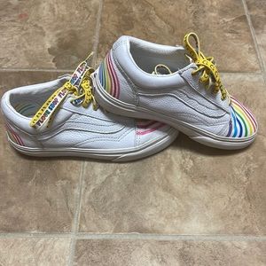 Vans. Size 13.5 kids.  White with rainbow on top and back